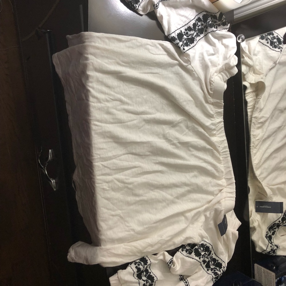 Black and white American eagle off the shoulder